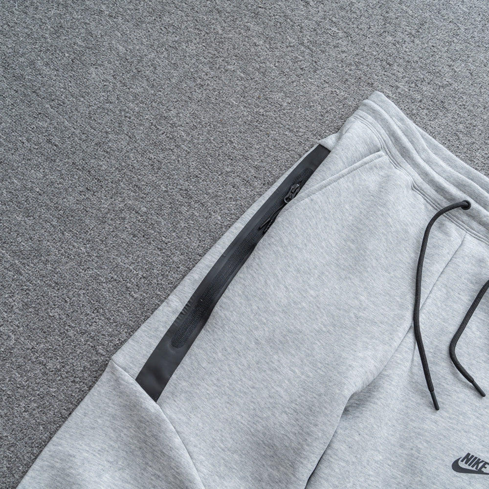 Calça NK Tech Fleece Cinza